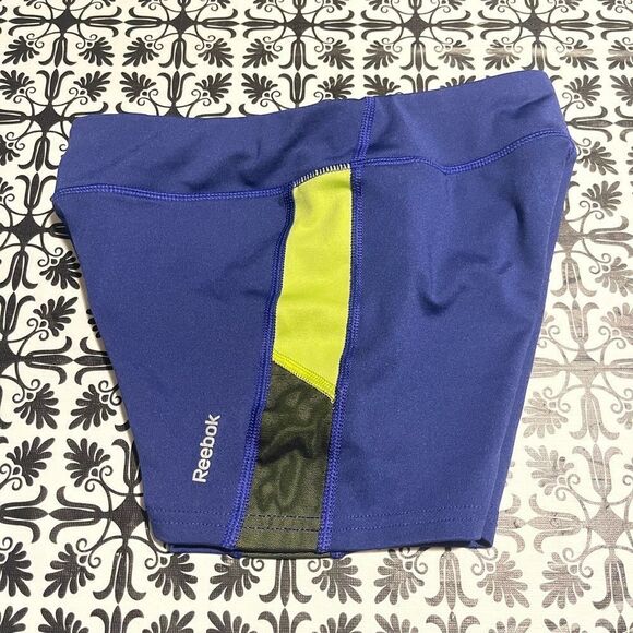Reebok
- Girls purple / neon yellow spandex shorts - Picture 3 of 6